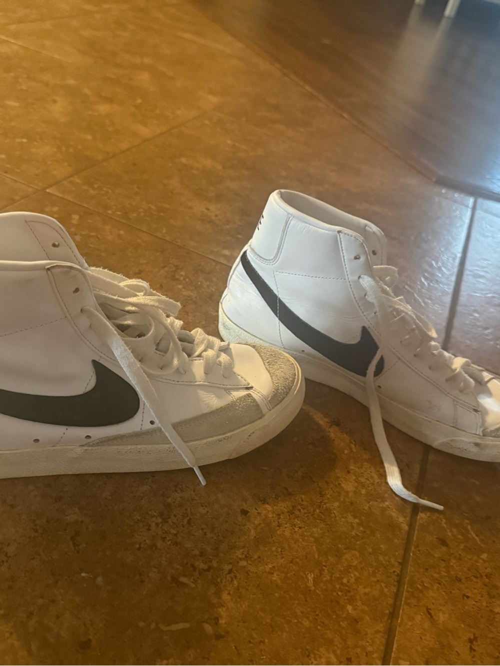Nike White High-Top Sneakers with Black Swoosh Accent